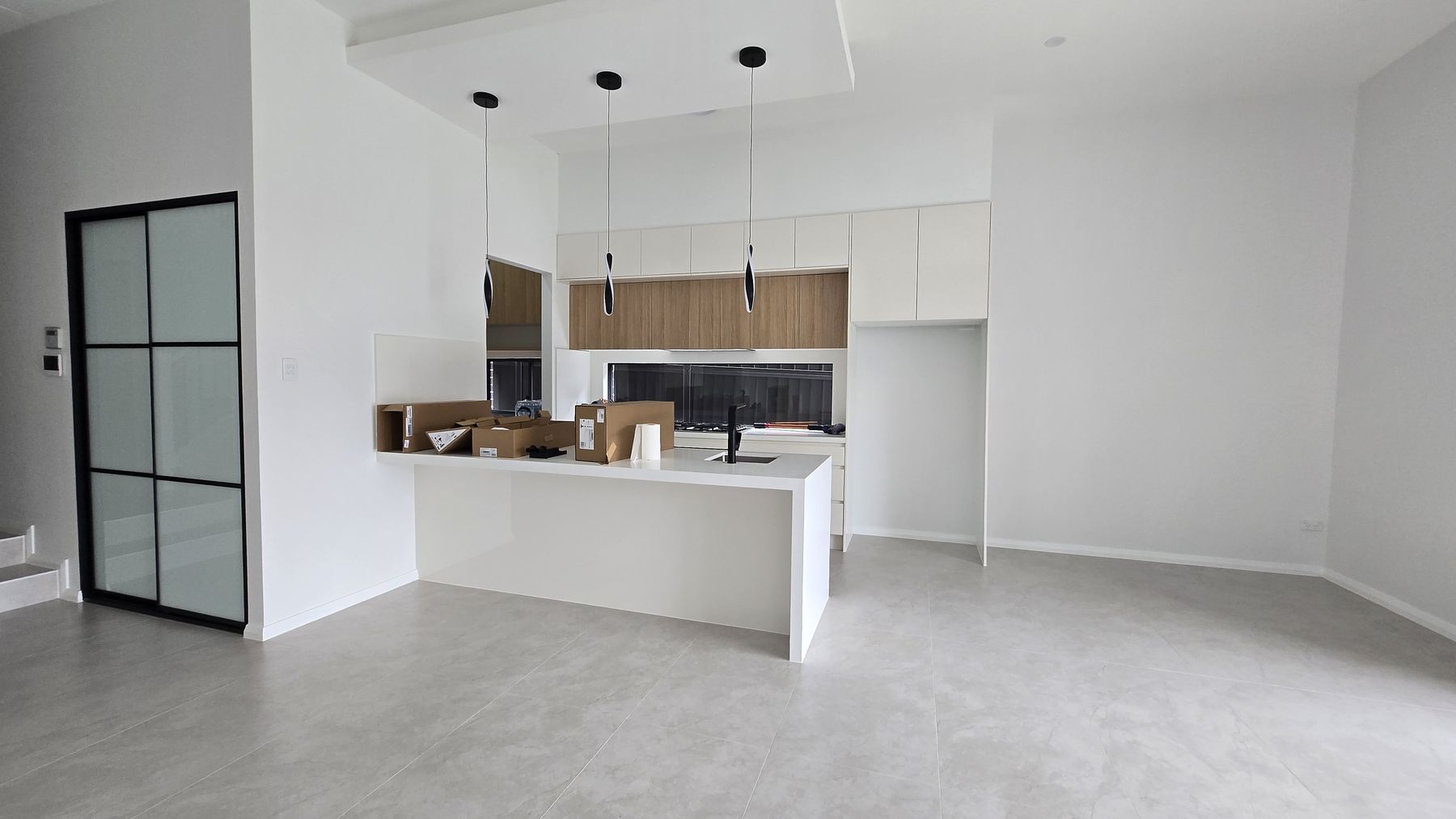 Before — the untouched kitchen and island